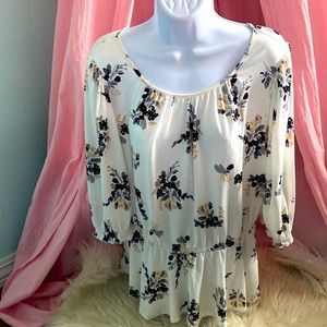 This classy floral shirt is so cute and will go with anything